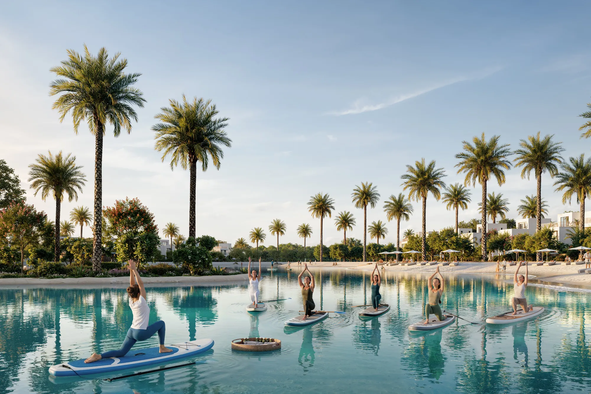 Paddleboard yoga on the palm-fringed lake beside the beach