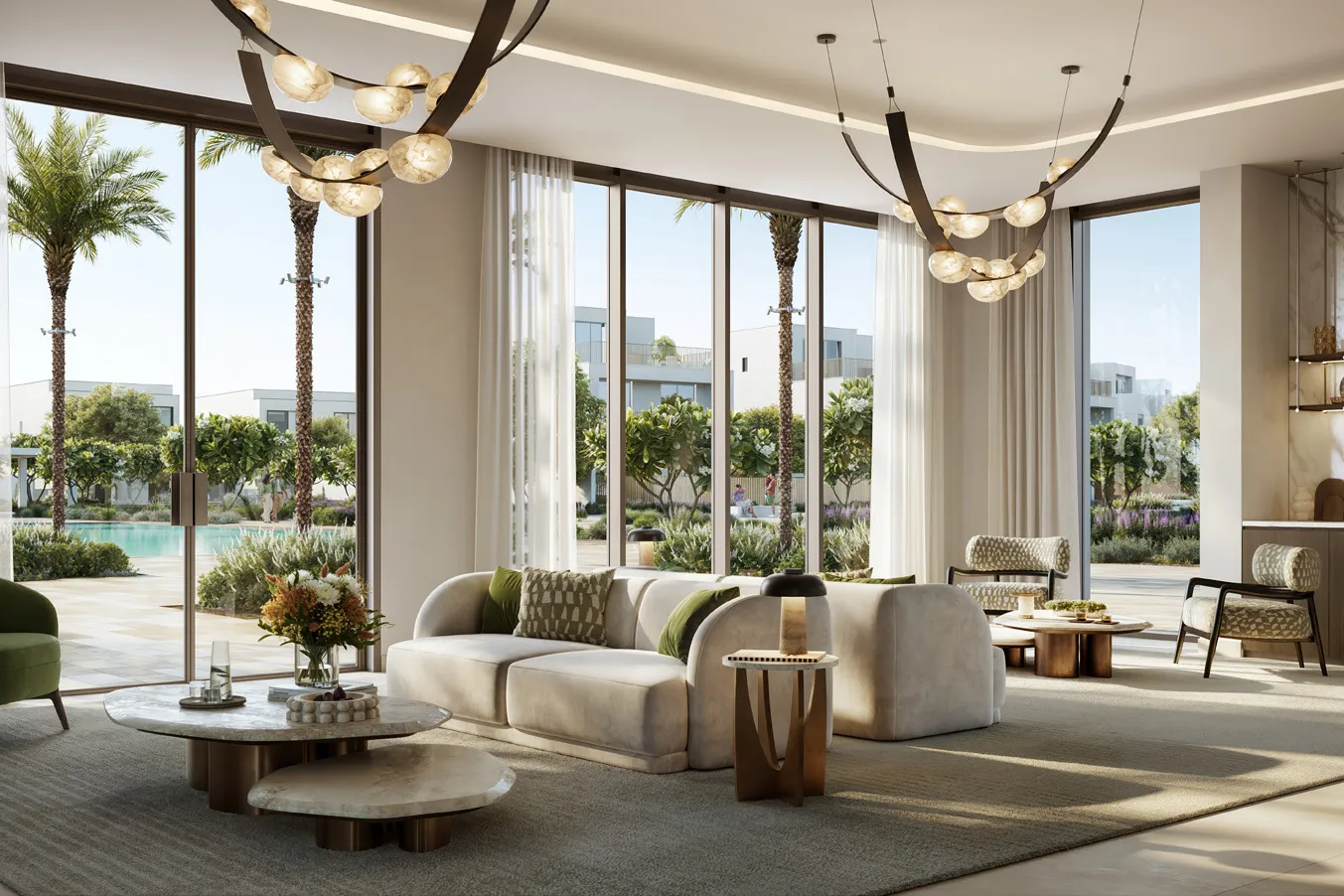 Lounge with sculptural chandeliers and tall windows onto gardens